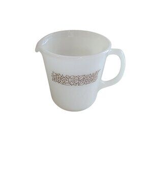 vintage Pyrex creamer pitcher in the Woodland pattern